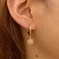 Elegant gold hoop earrings with sparkling crystal flower charms for women's daily wear - Six Petal Flower Style (KE1771)