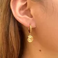 Elegant gold starfish hoop earrings with textured spiral conch shell pendants for beach style - Snail Shell Style (KE1777)