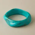Wide acrylic bangle featuring a unique teal marble resin texture and organic shape - Lake Green Ink Pattern (AB0054-3)