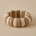 Detailed view of elastic beaded bracelet with beige and coffee acrylic segments - Beige And Coffee Alternating Arc Style (AB0068-6)