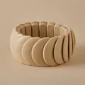 Close-up of a wide chunky cream resin stretch bracelet featuring a minimalist sleek design - Widened Smooth Flake Style (AB0069-1)