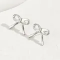 Elegant 3D bow stud earrings in silver metal with a polished finish for women - Silver 3D Ribbon Bow (BSSP003B)