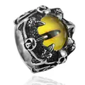 Macro detail of gothic claw ring with a yellow dragon eye and skull metalwork - Size 7 / Yellow Eye
