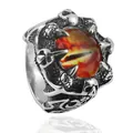 Detailed close-up of a dragon claw ring with red dragon eye and skull relief carvings - Size 7 / Flame Red Eye