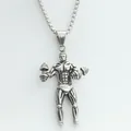 Detailed close-up of a muscular bodybuilder pendant with dumbbells in vintage steel - Pendant Only (No Chain) / Silver