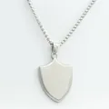 Close-up of a silver shield pendant with brushed texture on a box chain necklace - Pendant Only / Silver