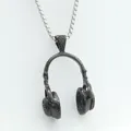 Macro detail of a black textured headphone pendant with a silver box chain necklace - Large Pendant / Black / Pendant Only (Without Chain)