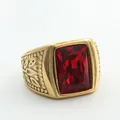Macro shot of rectangular red gemstone on a golden stainless steel ring with leaf relief - Size 7 / Gold Red