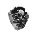 Vintage stainless steel skull ring with side wing details in a gothic punk style - US 7 / Silver