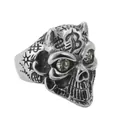 Close-up of vintage punk skull ring with star patterns and gemstone eyes - US 7 / Silver White Zirconia - Letter B
