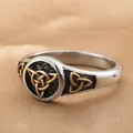 Vintage Irish Triquetra ring in polished stainless steel with golden Celtic knot accents - US 7 / Two-tone (Gold & Silver)