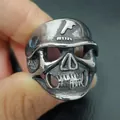 Detailed view of vintage steel skull ring with embossed forehead emblem in punk style - Size 8 / Embossed Logo Skull Style (6Silver) / Silver