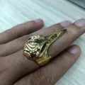 Vintage gold hawk skull ring made of titanium steel worn on a man's finger - US 7 / Gold