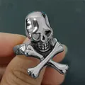Macro view of skull ring with heart-shaped eye sockets and vintage silver finish - Size 8 / Heart Eye Skull Style (22Silver) / Silver