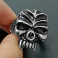 Detailed close-up of retro titanium steel skull ring with vintage blackened finish - Size 8 / Gothic Distressed Skull Style (23) / Silver