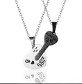 Close-up of interlocking heart and key necklaces with I LOVE YOU laser engraving - Silver-Black Set