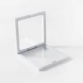 Close-up of a white 3D floating display frame with PE film for jewelry and accessories - 9x9cm / White
