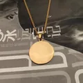 Polished golden stainless steel round disc pendant necklace on rectangular link chain - 20mm / Gold