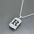 Collier en acier inoxydable argenté avec pendentif lettre R évidé sur une chaîne vénitienne - Lettre R / Argent