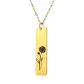 Close-up of golden stainless steel necklace with rectangular floral engraved bar pendant - Daisy Style (4)
