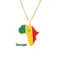 Close-up of golden Senegal map pendant with national flag colors and green star detail - Senegal Style