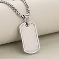 Macro detail of silver rectangular military dog tag pendant with a sturdy steel box chain - Silver