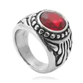 Close-up of a vintage punk ring with a large red ruby gemstone and steel relief carvings - US 8 / Steel Red Stone