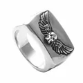 Gothic punk titanium steel ring featuring a detailed skull and wings relief design - US 7 / Retro Silver