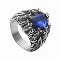 Macro detail of vintage dragon claw ring holding a faceted blue crystal stone - US 7 / Antique Silver Blue
