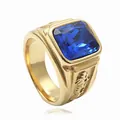 Detail of men's gold titanium ring featuring a square blue stone and dragon carvings - Gold Blue
