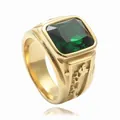 Detail of gold square signet ring with emerald green stone and side dragon relief - Gold Green