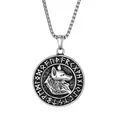 Detailed close-up of a Nordic Viking wolf head pendant with engraved rune circle - Wolf Head Style