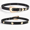 Fashionable black women's belt with gold round rivets and unique pin buckle closure - Standard Length / Black