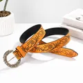 Vintage Y2K orange leather belt with bohemian embossed floral patterns and metal buckle - 105cm / Round Textured Pin Buckle Style / Turmeric