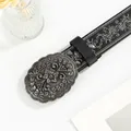 Detail of vintage embossed belt with large silver floral engraved buckle and silver patterns - Silver Floral Carving / 100