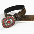 Detailed macro view of western belt with silver embossed buckle and red turquoise stones - 100cm / Red Howlite