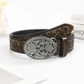 Vintage western cowboy belt with embossed floral patterns and large silver metal buckle - Coffee / 100cm