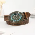 Western brown leather belt with embossed floral patterns and vintage turquoise buckle - 100cm / Brown