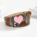 Vintage western brown leather belt with floral embossing and heart wing buckle - 110cm / Pink Heart Wings