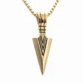 Macro detail of a punk gold spearhead pendant with V-shaped engraving on a box chain - Pendant Only (No Chain) / Antique Gold