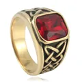 Macro detail of men's vintage gold ring featuring a red square gem and Celtic knot texture - Gold Red Stone