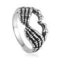 Gothic punk titanium steel ring featuring skeleton hands forming a heart shape on white - US 7 / Silver