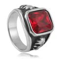 Macro shot of punk steel ring with square red gemstone and detailed skull carving - Size 7 / Silver With Red Stone