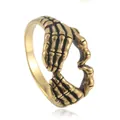 Vintage gold skull hand ring in punk heart shape made of durable stainless steel - US 7 / Gold