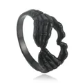 Gothic black skeleton hands ring forming a heart shape, made of punk stainless steel - US 7 / Two-tone Gold Black