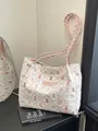 Borsa tote trapuntata con motivo a orso e spalline rosa in finitura bianco crema - Rosa Senza Pendente