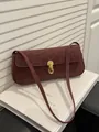 Dunkelrote Unterachseltasche aus Wildleder mit Leopardenmuster und Goldverschluss - Rot