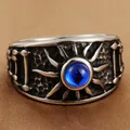 Detail of vintage stainless steel ring with sun engraving and blue stone inlay - US 7 / Steel Color Blue Stone