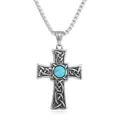 Macro detail of punk cross pendant with Celtic knotwork and green turquoise stone inlay - Silver (Turquoise)