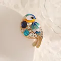 Exquisite bird brooch with enamel wings, blue rhinestones and sparkling crystals - Multicolor Bird (XZ34-001)